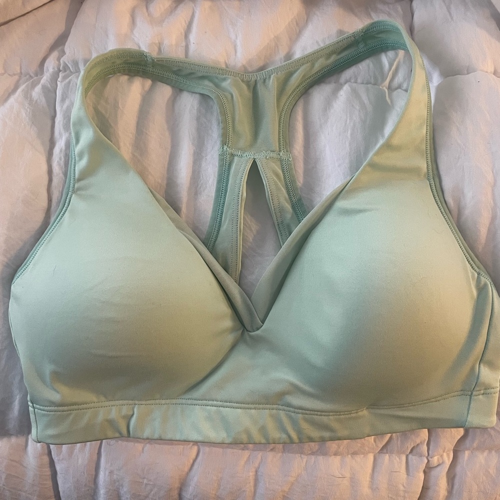 Mint green racer back sports bra.